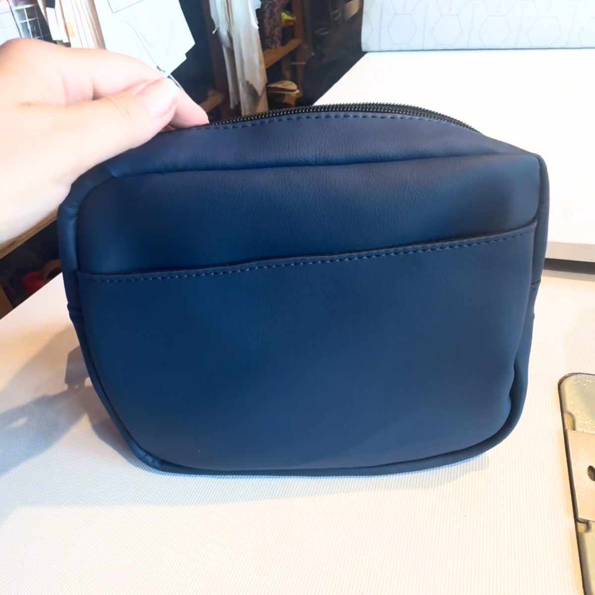 A navy blue faux leather horse training treat bag/pouch from DRYVIS